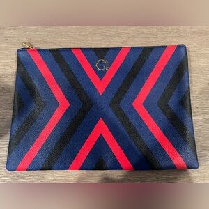C. Wonder Blue and Red Chevron Clutch